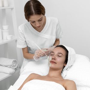 woman beauty salon face treatment