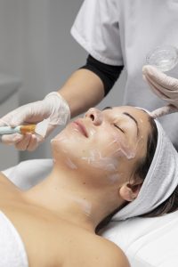 woman having facial treatment