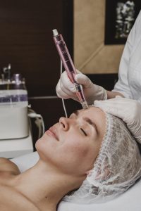 woman wellness center having cosmetic treatment
